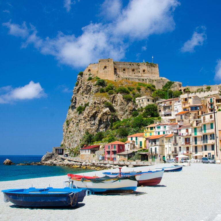 Fishing colorful boats on sandy beach, Scilla, Calabria, Italy